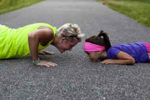 father daughter enjoying exercise